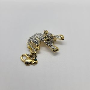 Rhinestone cat and mouse brooch.